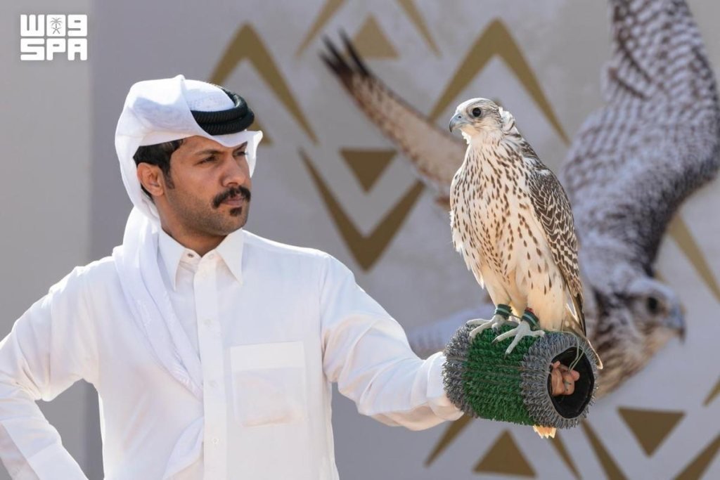 A falconer holding a bird in SPA’s report on the 2026 Al-Melwah opening